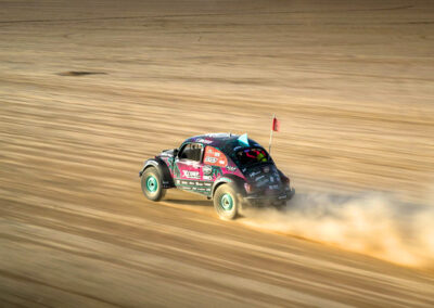 Off-road racing vehicle with switch-pro power system in the desert.