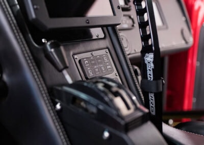 Advanced vehicle power management system displayed on a truck dashboard for off-road or utility vehicles.